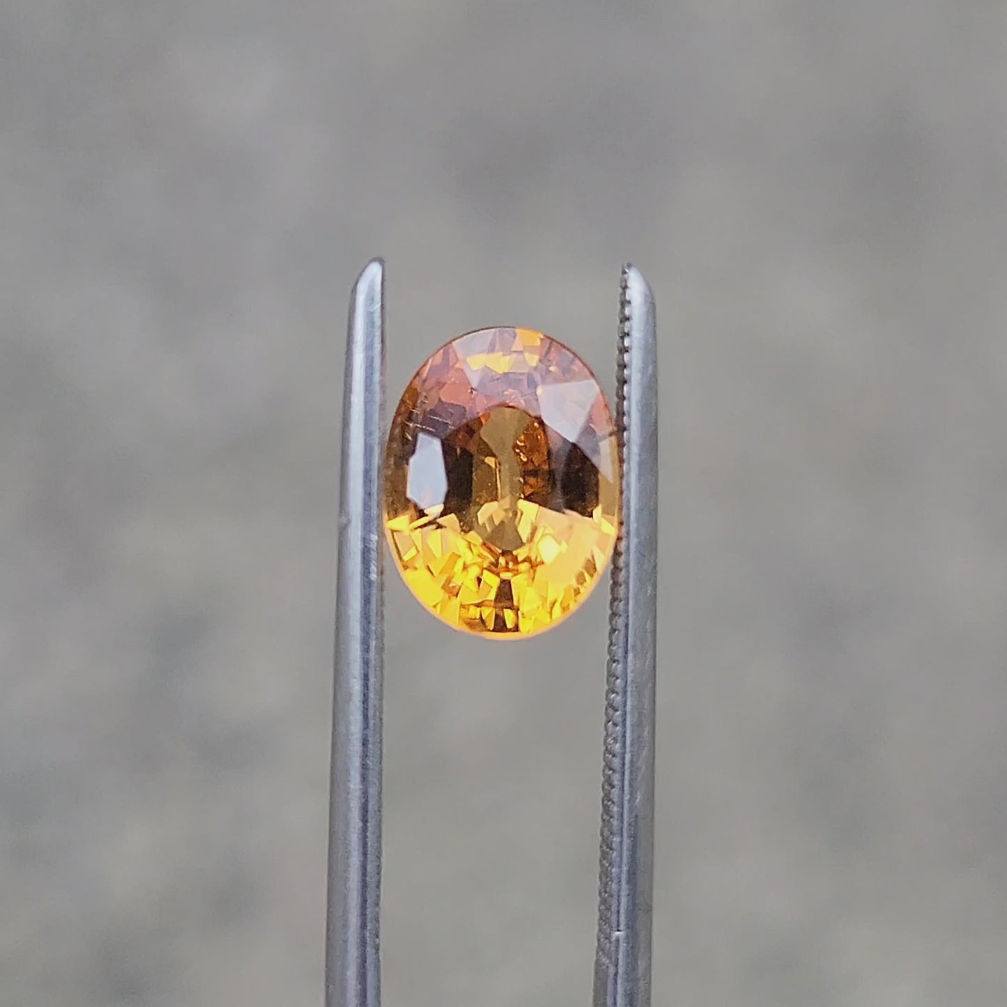 Load and play video in Gallery viewer, 1.69ct Natural Oval Mandarin Garnet
