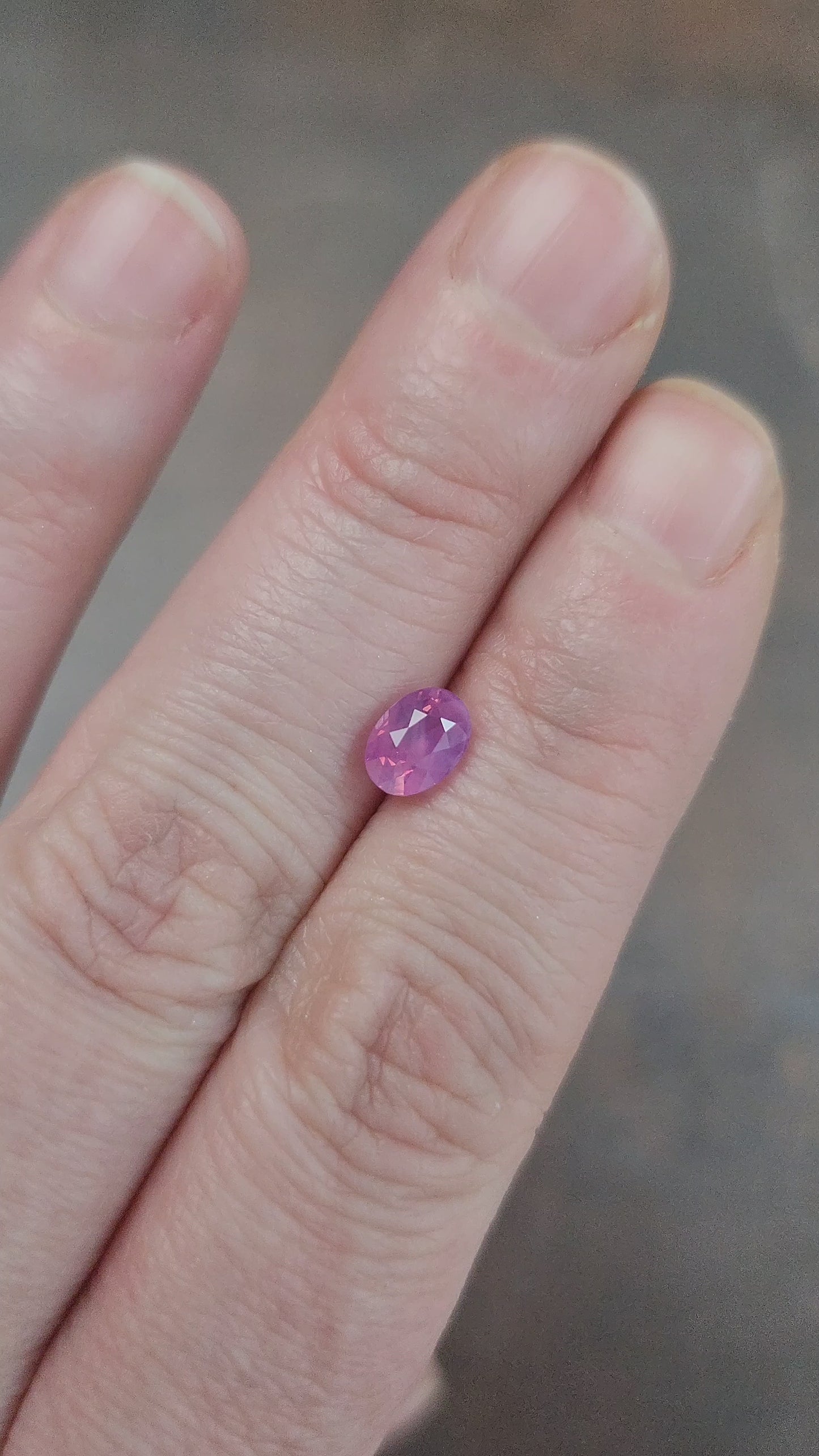 Load and play video in Gallery viewer, natural purple pink oval sapphire from Sri Lanka

