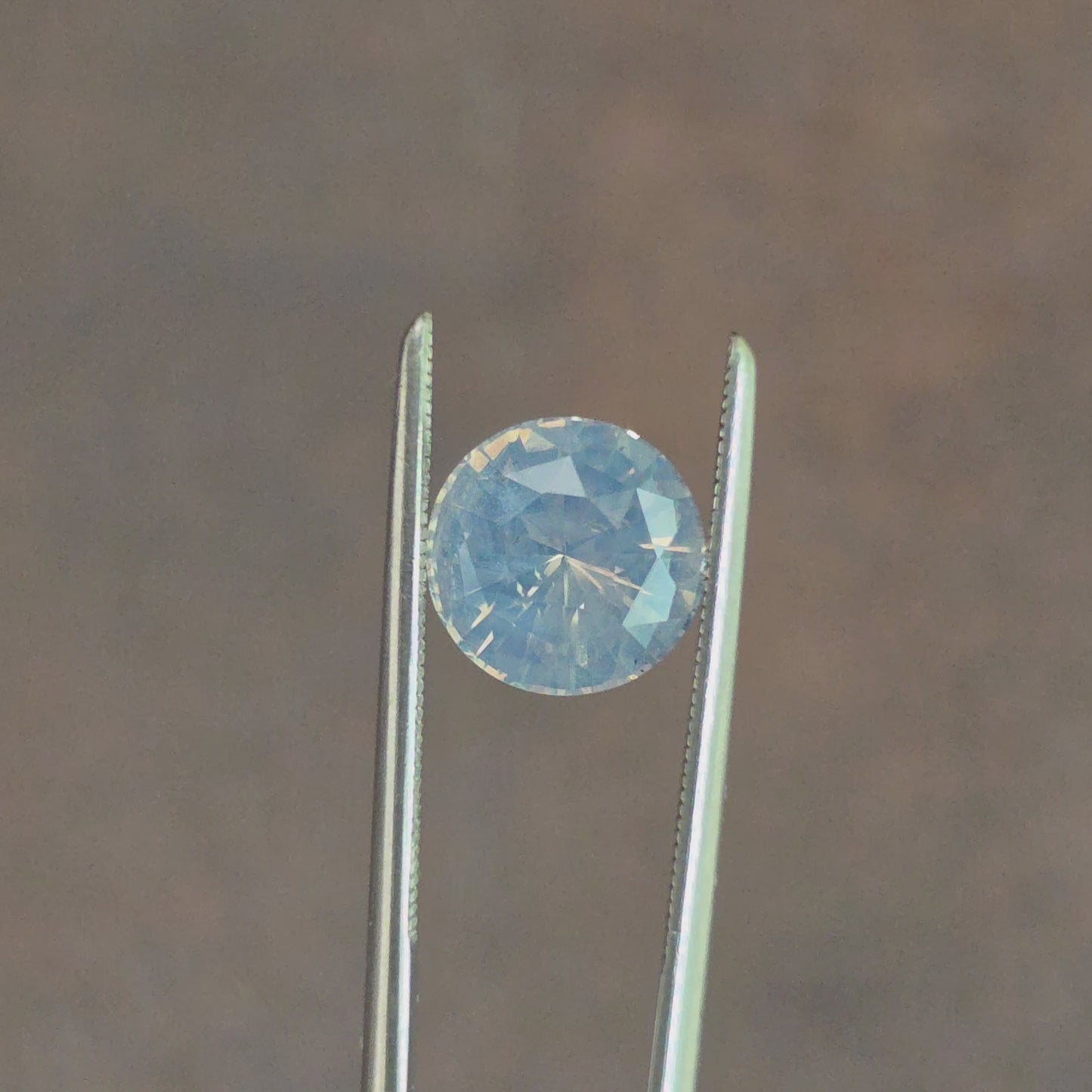 Load and play video in Gallery viewer, 2.58ct Round Natural Opalescent Blue Sapphire
