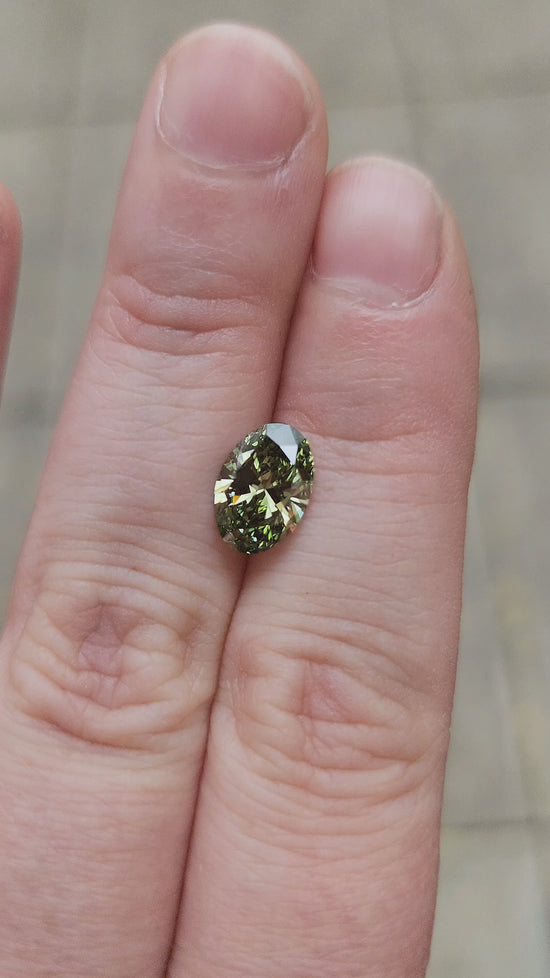 Load and play video in Gallery viewer, 1.79ct Oval Green Lab Diamond VS1
