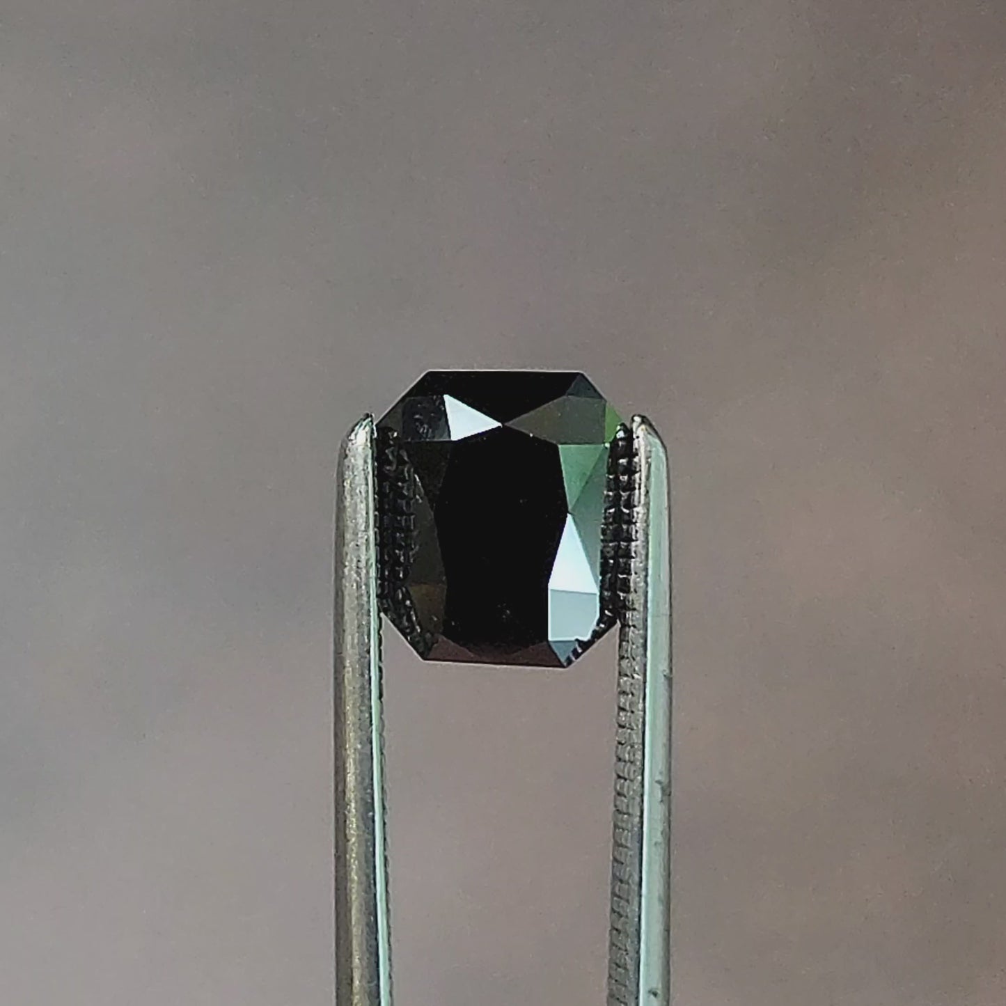 Load and play video in Gallery viewer, 1.26ct Faceted Radiant Black Diamond (Heat Treated)
