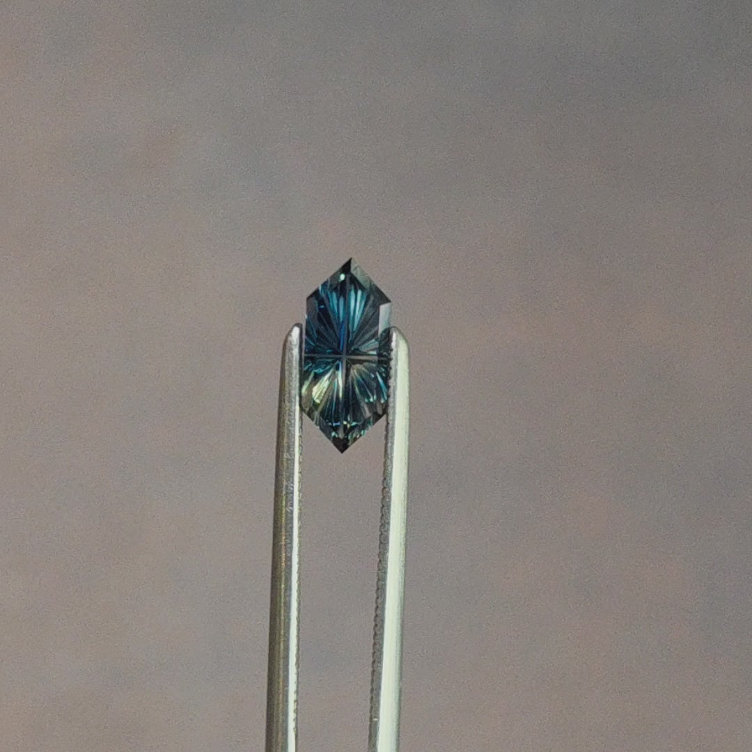 Load and play video in Gallery viewer, .76ct Parti Natural Australian Sapphire Fantasy Cut by Brett Kosnar
