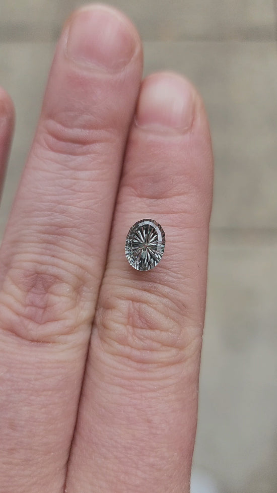 Load and play video in Gallery viewer, 1.75ct Natural Blue Green Oval Montana Sapphire - Starbrite Cut by John Dyer
