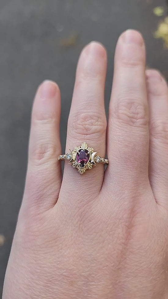 Load and play video in Gallery viewer, Pear Rhodolite Garnet Engagement Ring with Crescent Moons and Diamonds - Moon Fire Celestial 14k Yellow Gold Wedding Ring
