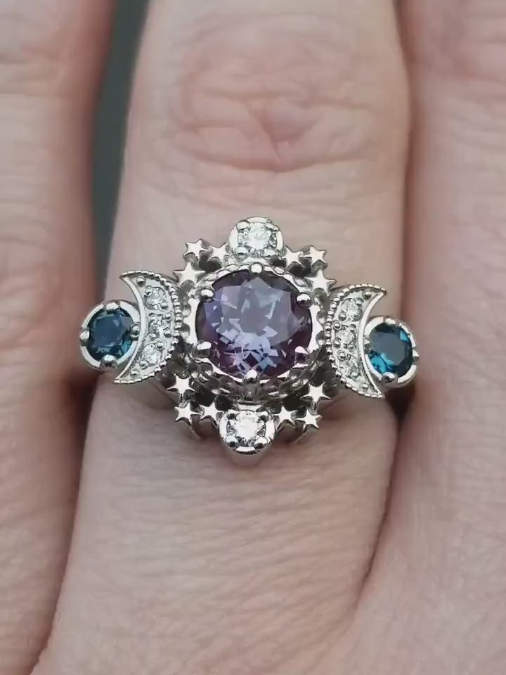 Load and play video in Gallery viewer, Alexandrite Engagement Ring with London Blue Topaz Cosmos Gothic Celestial Engagement Ring - 14k Palladium Gold - Cosmic Bohemian Jewelry

