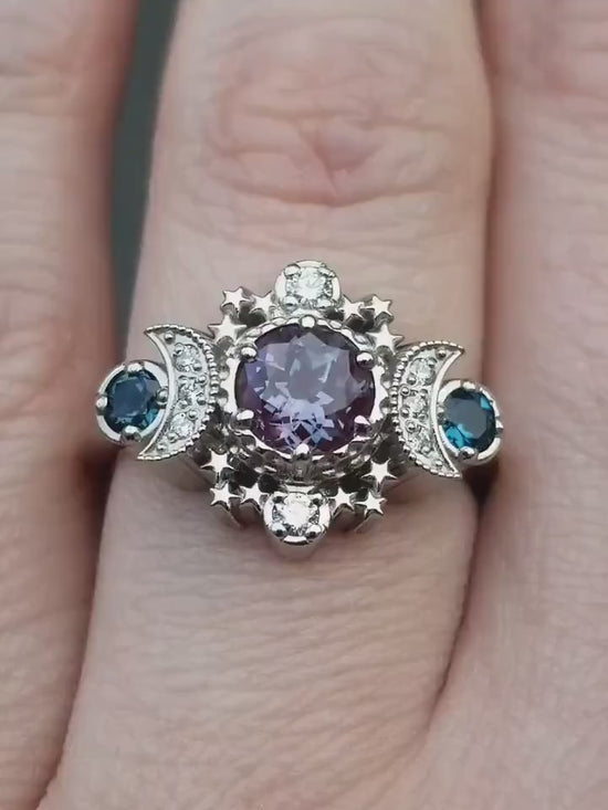 Load and play video in Gallery viewer, Alexandrite Engagement Ring with London Blue Topaz Cosmos Gothic Celestial Engagement Ring - 14k Palladium Gold - Cosmic Bohemian Jewelry
