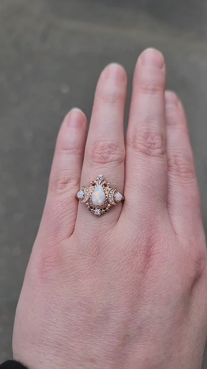 Load and play video in Gallery viewer, Pear Opal Cosmos Moon Ring with Diamonds - Star and Moon Engagement Ring - Chatham Opals - Celestial Wedding Fine Jewelry
