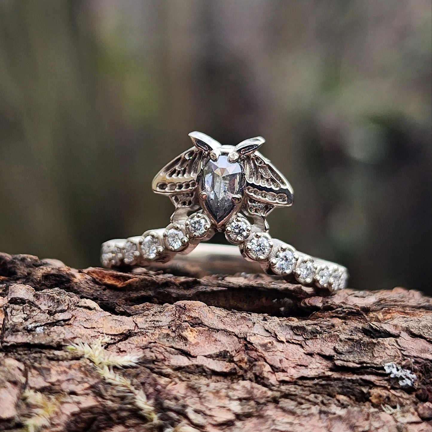diamond moth ring with pave chevron