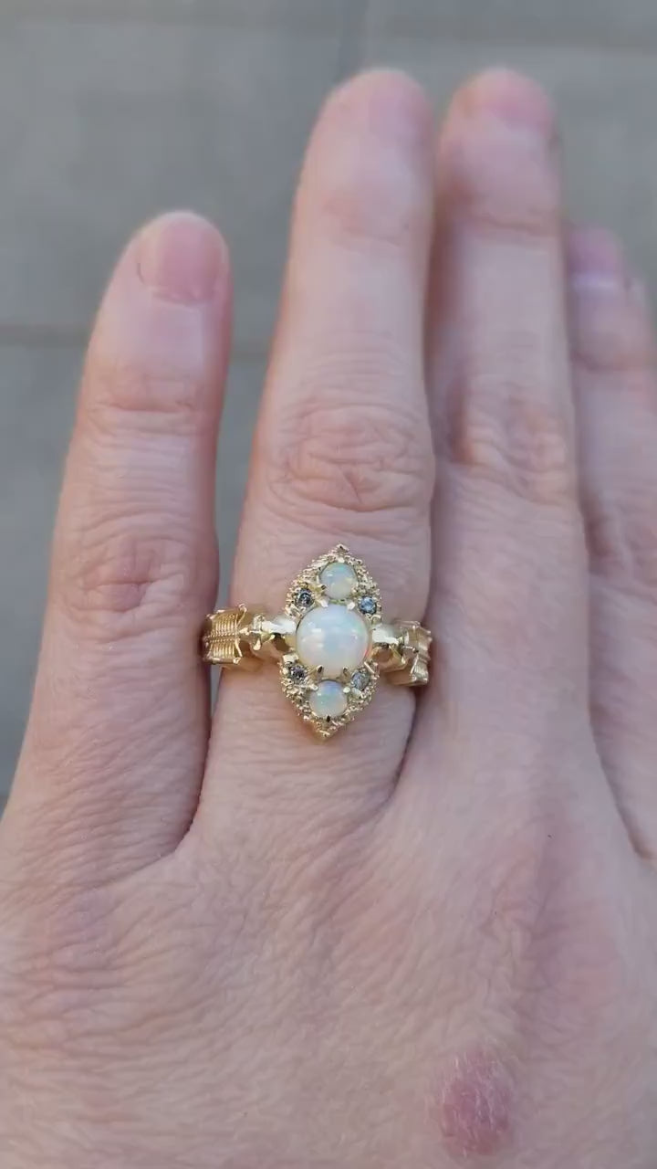 Load and play video in Gallery viewer, Gothic Skeleton Engagement Ring with Chatham Opals and Diamonds - 14k Yellow Gold - Grunge Alternative Wedding Promise Ring Memento Mori
