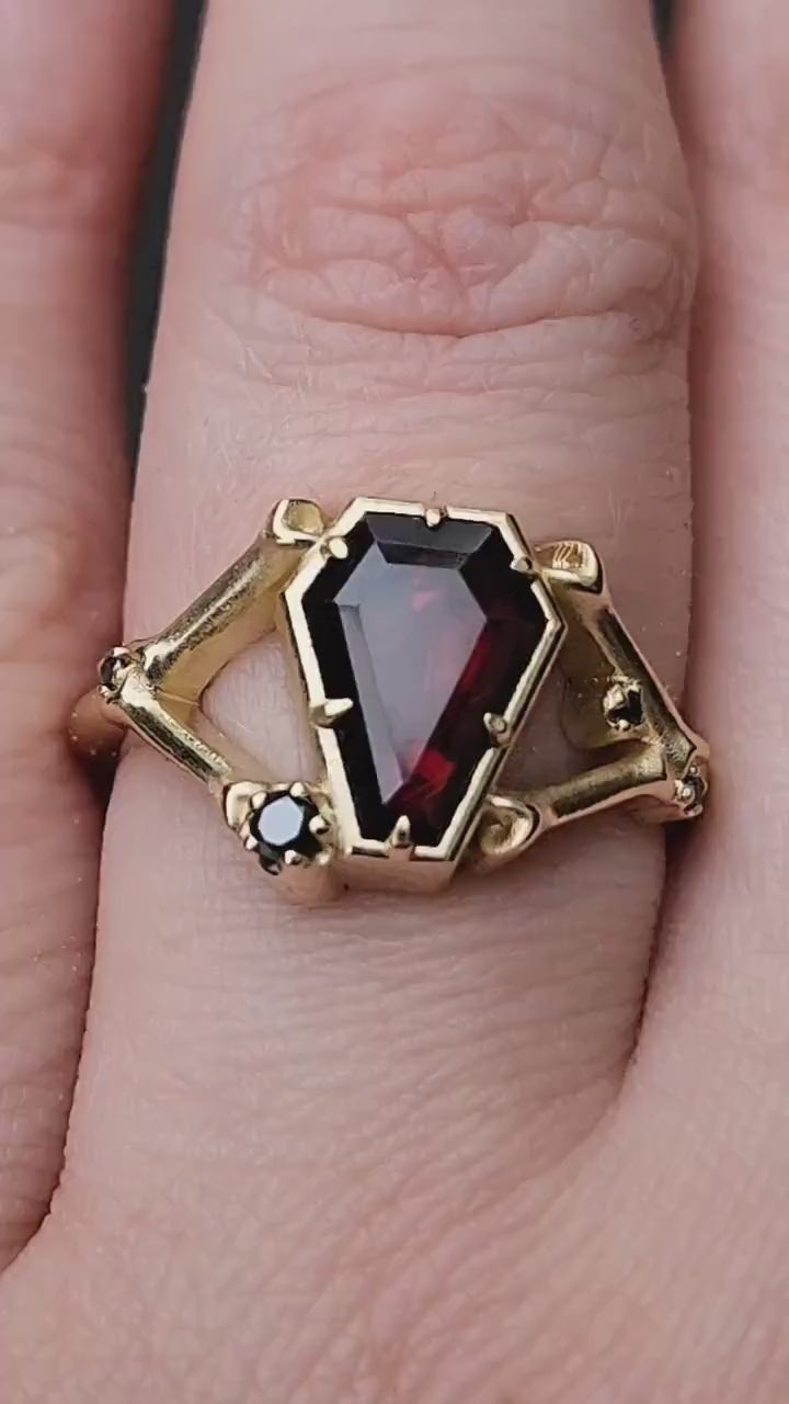 Load and play video in Gallery viewer, Red Garnet Coffin Skeleton Gothic Victorian Bone Ring with Diamonds - Unusual Spooky Catacomb Halloween Mourning Jewelry
