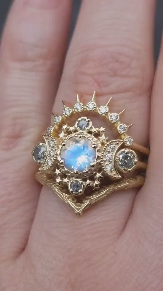 Load and play video in Gallery viewer, Cosmos Triple Moon Engagement Ring Set with Rainbow Moonstone and Galaxy Diamonds - Sunray &amp;amp; Forest Chevron Wedding Bands - 14k Yellow Gold
