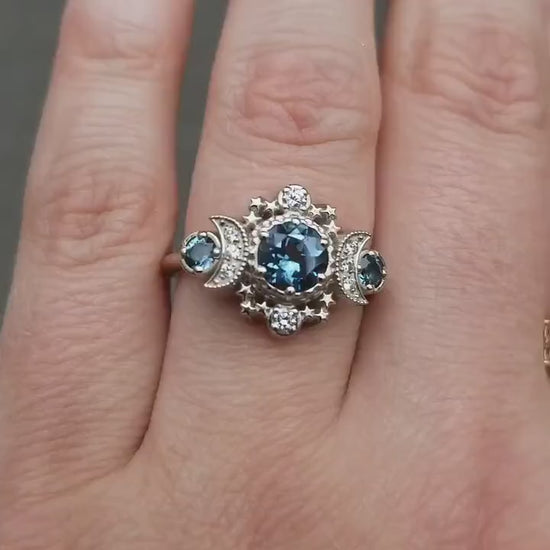 Load and play video in Gallery viewer, London Blue Topaz and Diamond Cosmos Engagement Ring - Triple Moon Goddess White Gold Jewelry
